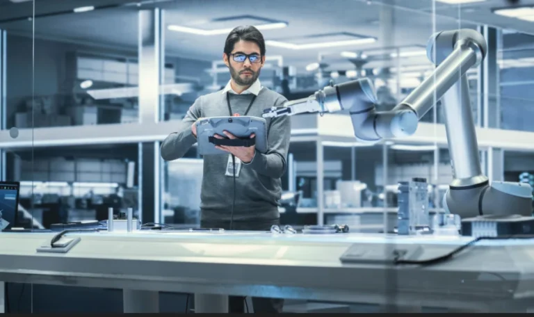 Engineer working with robotics and automation equipment - InnoFund - R&D Tax & Innovation Funding
