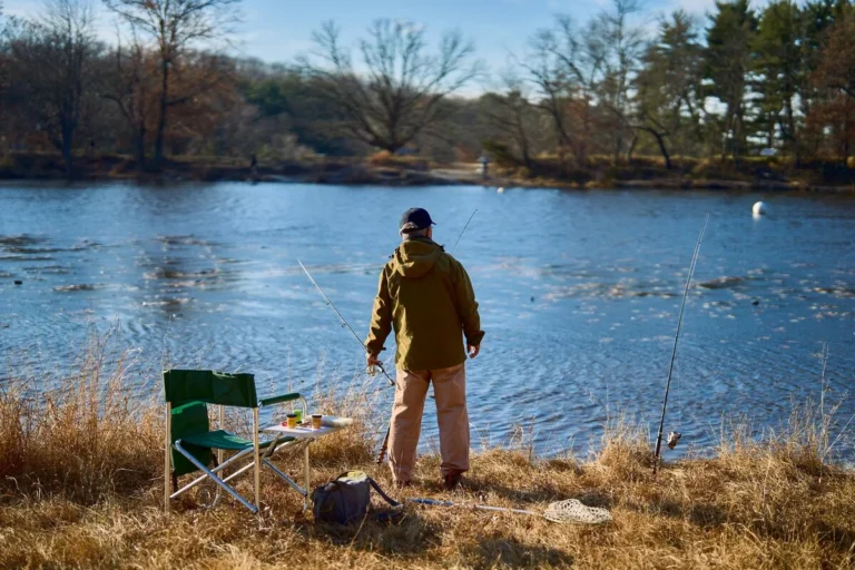 Fishing activity beside a lake representing aquaculture and sustainable fishing innovation - InnoFund - R&D Tax & Innovation Funding